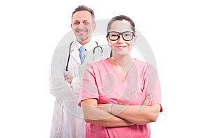 Male doctor with nurse standing with folded arms