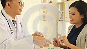 Male doctor patient examination woman in hospital