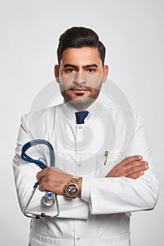 Male doctor posing at studio