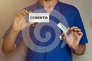 Male doctor prescribes prescription for pills DEMENTIA