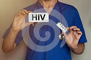Male doctor prescribes prescription for pills HIV photo
