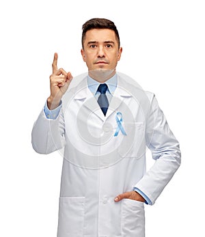 Male doctor with prostate cancer awareness ribbon