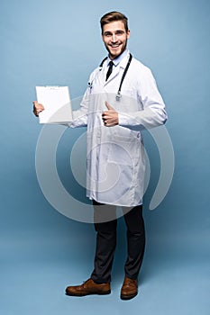 Male Doctor standing with folder, Doc is wearing white uniform and a tie, stands on a light blue background.