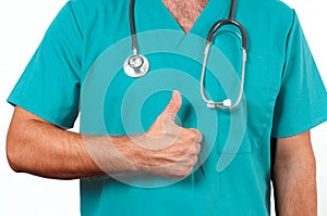 Male doctor with stethoscope showing thumb up