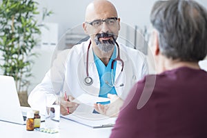 Male doctor talking to patient