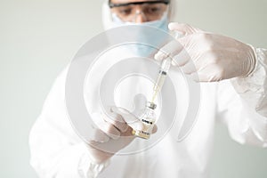 Doctor preparing COVID19 vaccine photo