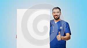 male doctor with white board showing thumbs up