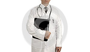 Male doctor in a white coat standing with a tablet computer in his hand