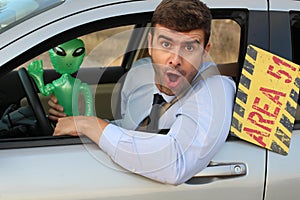 Male driver finding an Alien in Area 51, Nevada, USA photo