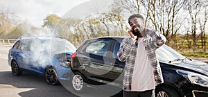 Male Driver With Whiplash Injury Calls Car Insurance Company On Mobile Phone After Traffic Accident