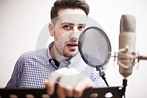 Male dub actor in dubbing room