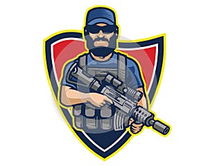 Male Elite Special Force Operator carrying Assault Riffle Cartoon Mascot Logo Badge