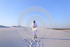Male Emirati designer completes site survey for construction sit