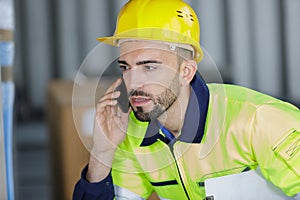 Male engineer check oil refinery phone talk concept