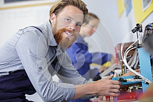 Male engineer checking electrical system