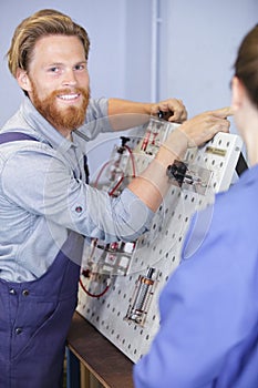 Male engineer checking electrical system
