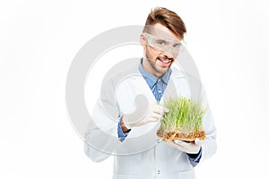 Male engineer showing a modified plants