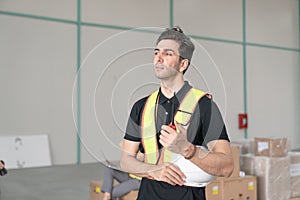 Male engineer stands gazing into the distance as a means to alleviate fatigue
