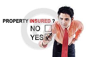 Male entrepreneur with text of property insured