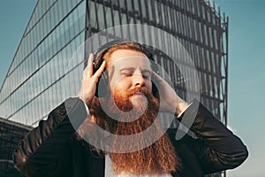 Male European businessman enthusiastic,calm,focused, with long beard