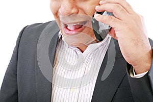 Male executive yelling on his mobile phone