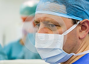 Male  experienced surgeon in operation room