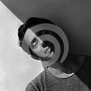 Male Face with Diagonal Shadow