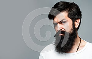 Male face profile with beard and mustache. Retro Beard. Male hair care concept. Bearded brutal hipster serious man with