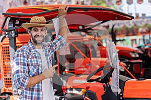 Male farmers visit an agricultural machinery exhibition