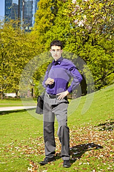 Male fashion model with a bag