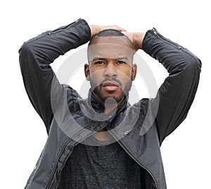 Male fashion model posing in black leather jacket