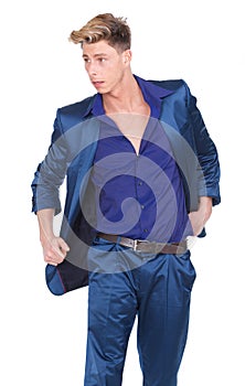 Male fashion model posing in blue suit