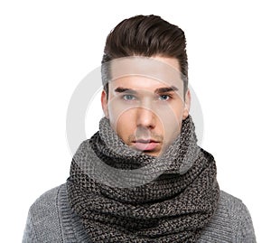 Male fashion model posing with gray wool scarf