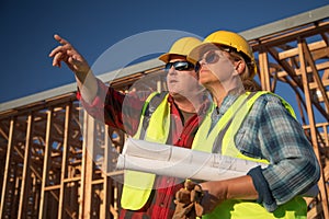 Male and Female Construction Workers at Construction Site