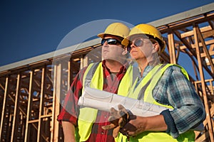 Male and Female Construction Workers at Construction Site