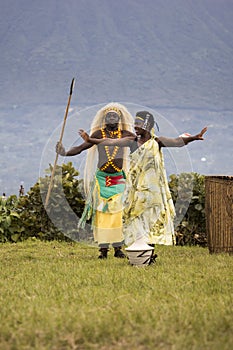 Male and female dancers in Rwanda native dance troop, Virunga, A