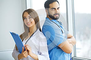 Male and female doctors work together in hospital