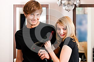 Male and female hairdresser