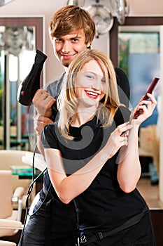 Male and female hairdresser