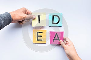 Male and female hand with notepaper color background.business photo