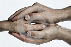 Male and female hands touch each other.