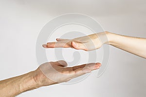 Male and female hands touching