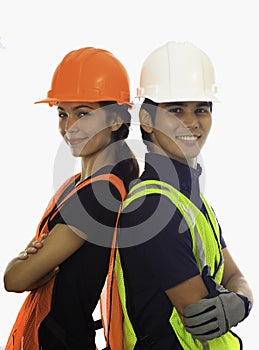 Male and female hardhat workers