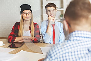 Male and female interviewed for a job