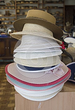 Male and female panama hats in workshop