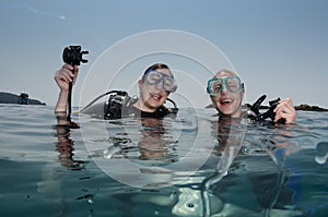 Male and female scuba divers