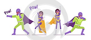 Male, female super hero in bright costume posing to attack