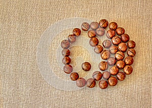 The male and female Yin-Yang symbol is made of macadamia nuts