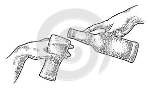 Male finger pouring beer from bottle into glass. The Creation of Adam