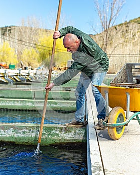 Male fishing sturgeon